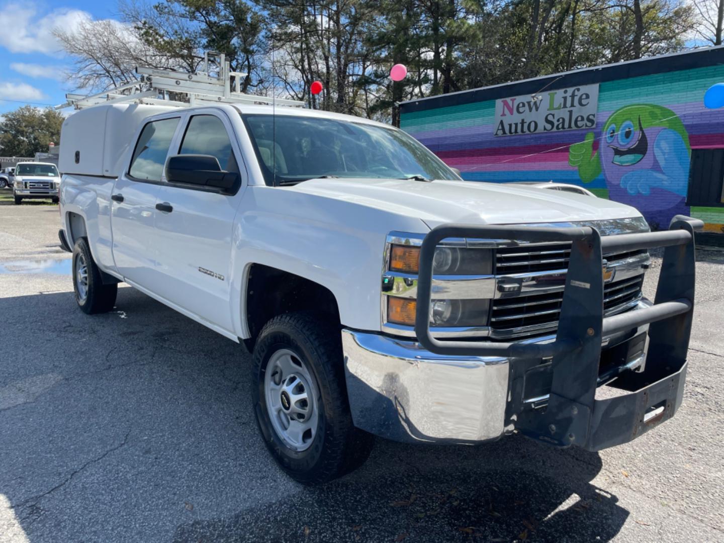 2015 WHITE CHEVROLET SILVERADO 2500H WORK TRUCK (1GC1KUEG7FF) with an 6.0L engine, Automatic transmission, located at 5103 Dorchester Rd., Charleston, SC, 29418-5607, (843) 767-1122, 36.245171, -115.228050 - Local Trade-in with Easy Clean Vinyl Interior, Backup Camera, AM/FM/AUX, Spacious Rear Seat, Power Windows, Power Locks, Power Mirrors, Utility Cab with Storage All Around, Pull Out Bed Storage, Ladder Rack, Safety Strobe Lights, Keyless Entry, Tow Package with Brake Assist, 4-Wheel Drive, Brush Gua - Photo#0